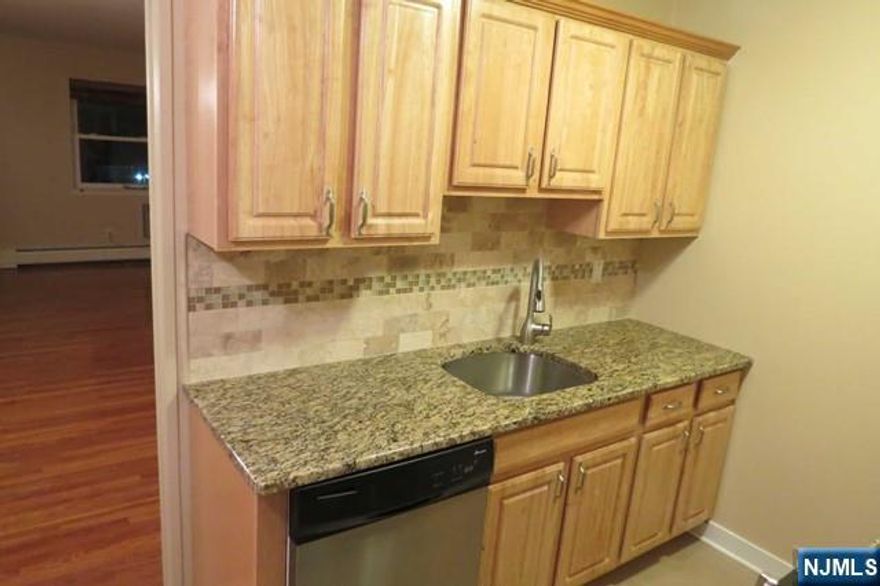 Renovated, 2 bedroom condo in Regency Park. Beautiful kitchen with granite, tile back splash and new cabinetry. New bathroom with stylish tile, vanity and fixtures. Hardwood floors and tons of closet space are just a few of the features that this condo offers. Conveniently located to downtown Ramsey, NYC transportation, shopping and award winning schools. Gas, heat and hot water included. Credit check, interview and tenants insurance required. Tenant pays for first $150 of repairs. No pets or smoking.