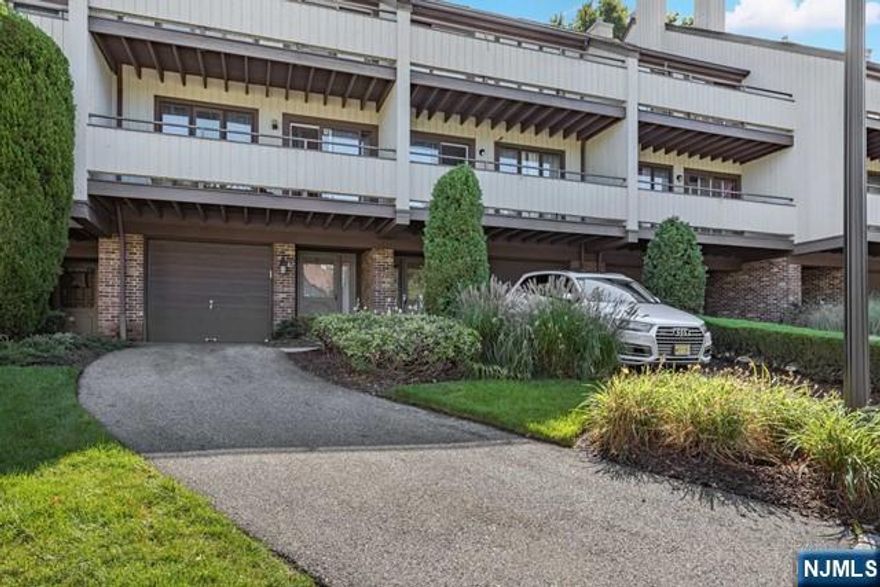 Meadowview Townhouse complex" Nice 2-bedroom + Den/office,3.5Baths, Two Balconies, One Deck, Renovated Kitchen with Granite countertops, 3.5 Baths, Beautiful hardwood floors throughout, attached one-car garage. Loads of storage space. Do not miss the full bath in the lower-level office/Den. Closter to NY Express bus, ranked school and shopping, Park, and Major Highways. NO PETS ALLOWED. **Landlord is offering rental price of $3,000 until July 31st, 2026**