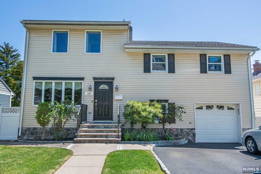 Welcome to 180 Corabelle Ave offering nearly 2,500 sq feet of living space. This trilevel home is perfect for a larger family with its finished basement with separate enterance. It offers an open concept dining, living, and kitchen area the moment you are welcomed in. This home features an extensive master suite that includes a large private bathroom with jacuzzi and a large walk in closet with the ultimate convenience of a washer/dryer hookup. The kitchen is custom and offers solid granite countertop, solid granite slab backsplash, and stainless steel appliances. The roof was replaced 4 years ago, top of the line boiler and copper plumbing. Only 12 minutes to the George Washington Bridge and a 5 minute walk to NJ Transit NYC Line. This home will not last!