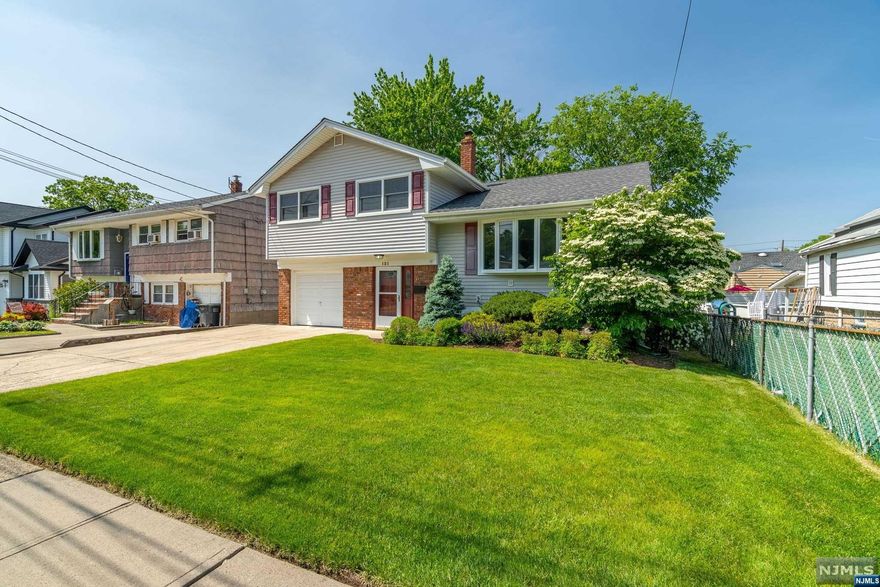 Well maintained 3 bedroom sugar maple split. House is located at the end of a dead end street. Backyard is lush and private with a deck and patio area. Hardwood floors on 1st and second floor under carpet. Second floor bathroom was recently updated. Basement family room was recently renovated. Newer hot water heater.