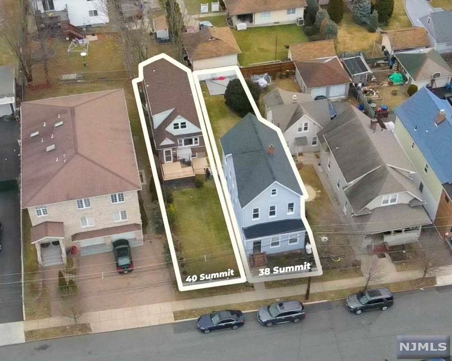 Looking for a unicorn? This 4 unit property makes the perfect addition to any portfolio. 2 two-family homes sitting on one lot, located on one of the best streets in Garfield, NJ. The front house is a 1 bedroom 1 bath over 1 bedroom 1 bath, along with a bonus unit in the basement. The back house is a 3 bedroom 2 bath, over a 1 bedroom 1 bath. Parking opportunity along with a very good sized yard make this a prime owner occupant property. Be sure to make an appointment today before this unicorn is gone!