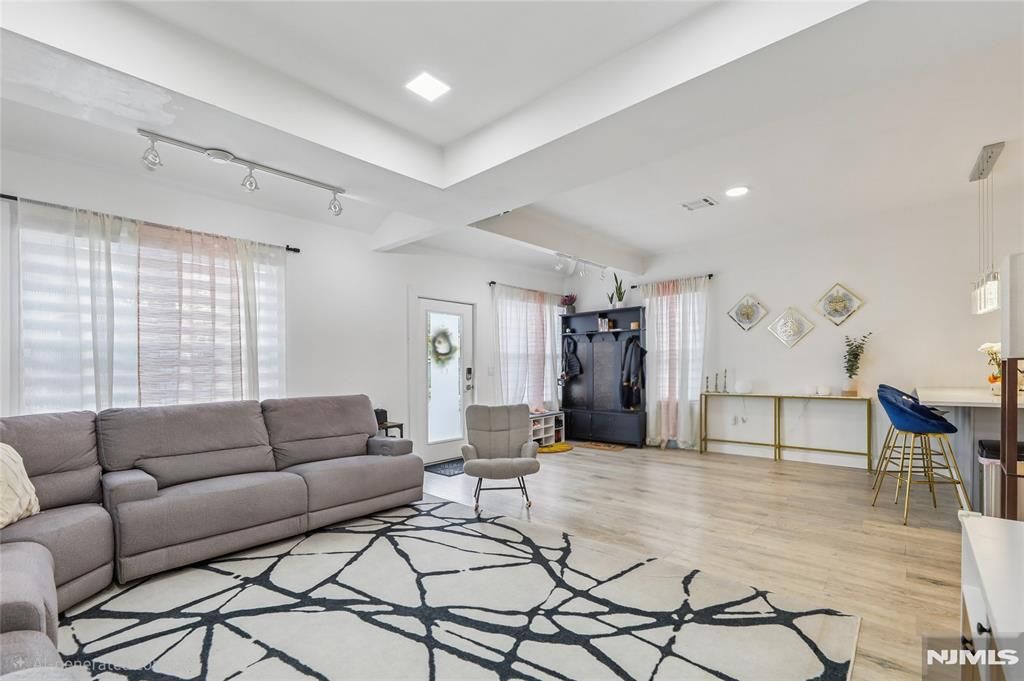 Photo of 84 Center Avenue, Little Falls, NJ 07424 (MLS # 25042801)