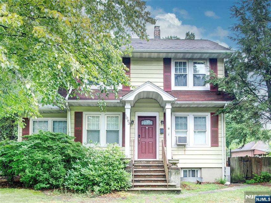 This classic Dutch Colonial is full of potential and ideally located close to shopping, public transportation, schools, and major highways. Set on an oversized 100x100 lot, the property offers a spacious fenced yard and a detached garage, great for outdoor living and storage. Inside, you'll find a formal living room, formal dining room with closet and sunroom, galley-style kitchen with stainless steel appliances, gas cooking, plenty of natural light and a door that leads to the deck and extra large backyard. The second floor includes three bedrooms, while the walk-up attic space includes a flexible bonus room, ideal for a home office or creative space. Hardwood floors and beautiful moldings flow throughout, adding timeless charm and character. The partially finished basement expands your living area with a laundry room, full bathroom, and a bonus room that can serve as a gym, office or playroom. While you can move right into this home, it also presents an excellent opportunity for buyers to bring their vision and updates to make it truly their own.