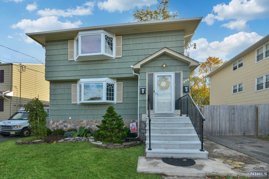 Move right into this beautifully updated, expansive 2 family home in Pompton Lakes! Plenty of room to spread out with upper and lower units comprising of 3 bedrooms and 1 and 1/2 baths. Nearly identical floor plan for both units featuring large eat in kitchen with granite countertops, updated baths, and spacious living room. Each primary bedroom has ensuite half bath. Lots of closets and storage. Hardwood floors and air conditioning top off the modern amenities. Fully finished basement ready for entertaining and relaxation or an office. What a bonus! Basement also holds all utilities (separate) and laundry for each floor. No flood and no plume! Great location! Close to I-287 for an easy commute and a few blocks from shopping, restaurants and more. Don't miss this gem!