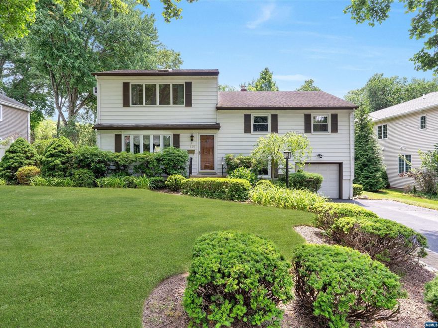 Welcome to this delightful expanded multi level split home in coveted Paramus featuring 5 bedrooms & 2.5 baths. Whether you choose to renovate, expand, or build to suit, this rare and desirable 74x178 lot size offers endless possibilities. This home is ideal for extended family, offering four distinct levels of living space & a finished basement. Additional features include newer windows, hardwood floors, ample closets, a front yard sprinkler system, generator hook-ups, vaulted ceilings w/skylights, alarm system, and C/A (excluding the third-floor extension, which includes A/C wall units & electric heat). The backyard is perfect for summer barbecues & gatherings, & plenty of room for a pool. Situated in a highly sought-after neighborhood, this home provides convenient access to top-rated schools, NYC transit, shopping centers, major highways & low taxes. Ideal for families seeking convenience, this property is a must-see w/ tremendous possibilities! CALL 201.983.7819 for appt.