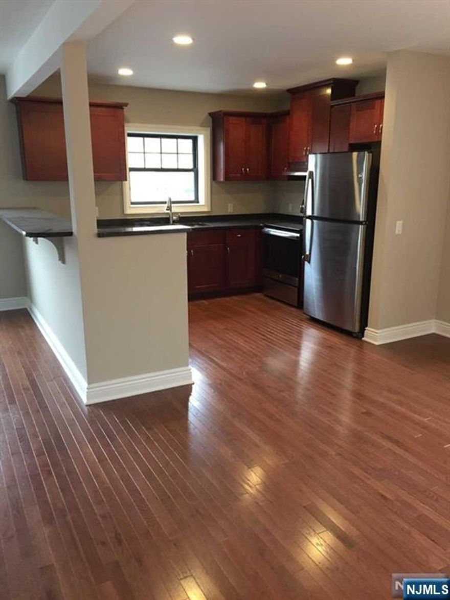 Location! Location! Location! Minutes away from shopping and transportation in both Midland Park and Wyckoff; this recently renovated one bedroom, one bathroom, open-concept apartment boasts hardwood flooring throughout, with a fully updated kitchen with stainless steel appliances (gas oven/dishwasher/microwave) and in-unit washer/dryer. Residential parking is provided. Rent includes hot water. Tenant pays gas and electric. Tenant application ($50 fee) and credit check required. Security deposit and first month's rent required at time of lease signing.