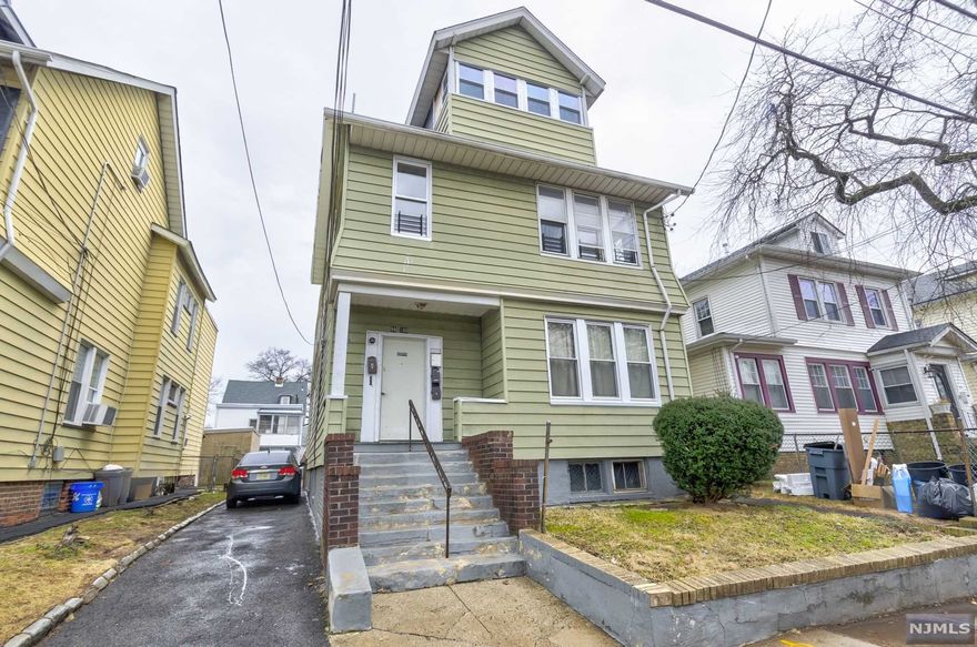 wonderful 2 family cashflow investment opportunity, this is a three-story house located close to major transportation schools and major highways like RT78, RT280, and GSP. This property offers a layout of 4 bedrooms 1 bath on the 1st floor, 5 bedroom 1 bath on the second floor, 1 bedroom 1 bath in the attic, second floor and attic could be used as a duplex. 1st floor is currently rented. Detach garage for 2 cars in the back and parking space for two additional cars.