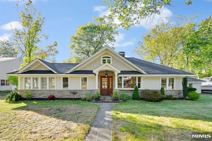 Fully Renovated Ranch with Guest Cottage! This Beautifully Updated Single-Level Home Has Been Thoughtfully Finished Providing Many Modern Comforts! Upon Entry, The Formal Living Room Welcomes You With 9-Foot Ceilings, Beautiful Aqua Guard Wood Flooring That Flows Throughout, A Wood-Burning Fireplace As A Focal Point, And A Bright Bay Window. The Adjoining Formal Dining Room Showcases Original Built-Ins Restored To Highlight Classic Craftsmanship. The Kitchen Is A Dream For Cooks, Featuring Quartz Countertops, A Center Island W/Breakfast Bar, And Premium Appliances Including A Viking Electric Cooktop, Built-In KitchenAid Microwave, And Double Wall Oven. Down The Hall, Bedrooms 1&2 Feature Double-Door Closets, While The Primary Includes 2 Closets & A Private Full Bath With Stall Shower. A 2nd Full Bath And Laundry Closet Complete The Main Hallway. At The End Sits A Sunroom Surrounded By Windows, Perfect Space For Enjoying Year-Round Views Of Changing Seasons. The Guest Cottage Adds 720sqft Of Additional Living Space, Offering A 25'x23' Open Area, A 5'x8' Galley Kitchen, A Full Bath, And A 12'x11' Bedroom Ideal For Guests, An Office, Or Studio. Recent Improvements Include A New Roof And Rafters, Electrical Replacement, New Utilities, Pella Windows, New Doors, And More, Delivering A Turnkey Living Experience. Close Proximity To Association Clubhouse, Beach, Boathouse, Tennis Courts, Dock, And Park. This Home Offers Comfort, Functionality, And The Benefits Of Awosting Community.