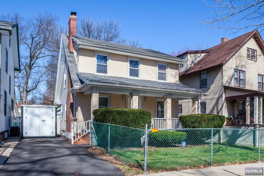 This home is waiting for you. Enter into the living room with wood burning fireplace, wall to wall windows that fill the room with sunshine Hard wood floors throughout the home. The formal dining room is decorated with venetian plaster that adds a touch of glamour it flows into the updated kitchen with granite counter tops . 2nd floor has 3 spacious bedrooms with full bath ,walk up attic for additional living space or storage. Basement is finished with full bathroom, laundry washer/dryer included and plenty of storage. Private fenced in yard for outdoor movie nights and great cookouts. One car garage with deep driveway. Home is heated by oil 250 tank is above ground in basement.