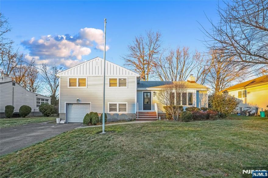 Welcome to 13 Garwood Road, Fair Lawn, NJ, a beautifully renovated split-level home offering modern comfort and convenience. This property features four spacious bedrooms and three well-appointed bathrooms, providing ample space for family living. The home's thoughtful design and recent renovations ensure a move-in-ready experience, with contemporary finishes and fixtures throughout. Located in the desirable Fair Lawn community, this residence is ideally situated for those seeking proximity to New York City, making commuting a breeze. The neighborhood is known for its excellent schools, vibrant community life, and easy access to shopping, dining, and recreational facilities. One of the standout features of this property is its private yard, perfect for outdoor gatherings, gardening, or simply enjoying a quiet moment. The split-level layout offers a dynamic living space, providing both privacy and connectivity across its multiple levels. Experience the perfect blend of suburban tranquility and urban accessibility at 13 Garwood Road. This home is a rare find in a sought-after location, offering a harmonious balance of style, function, and convenience. Don't miss the opportunity to make this exceptional property your new home. Schedule a viewing today to fully appreciate all that this residence has to offer.