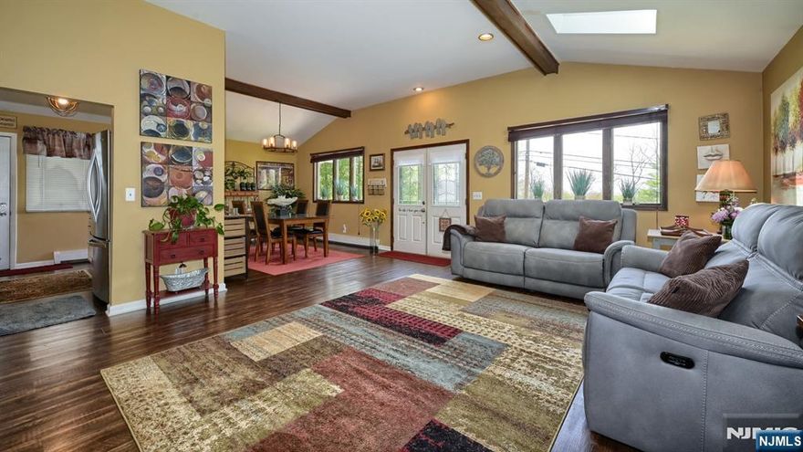 Looks are deceiving! Welcome to this Packanack Lake gemâ€”a beautifully updated 3 Bedroom, 2 Bath Ranch offering easy one-floor living and a perfect condo alternative. Step inside to a spacious, sun-filled interior featuring an open-concept Great Room with vaulted ceilings, exposed beam details, skylights, and walls of windows that flood the space with natural light. The updated Kitchen boasts stainless steel appliances, breakfast bar, and flows seamlessly into a separate dining areaâ€”ideal for everyday living and entertaining. The private Primary Suite offers an updated en-suite bath and dual closets, while two additional bedrooms and a full bath (with direct bedroom access) complete the layout. Access from the Kitchen leads to a fenced yard with a charming gardenâ€”low maintenance, high enjoyment. Additional features include a long driveway for ample parking and a built-in storage room. Extensive updates provide peace of mind: electrical panel (2018), skylights & central A/C (2020), furnace (2022), attic insulation & carpeting (2023), plus washer/dryer, French drain, primary bath shower, and siding/soffits all completed in 2025. Enjoy Packanack Lake living at its bestâ€”fishing, swimming, boating, playground, pickleball & tennisâ€”all just moments from your door.