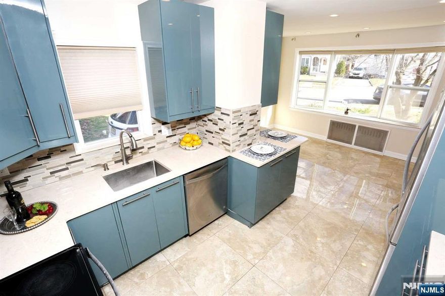 Move right into this beautifully updated 3BR Colonial in Fair Lawn! Ideally situated near schools, shopping, NY transportation, and downtown, this well-maintained home offers hardwood floors, a renovated kitchen with brand-new cabinets, and spacious dining and living rooms. The first-floor family room, complete with a full bath and yard access, can serve as an extra bedroom. Upstairs features three bedrooms and a full bath, while the freshly painted exterior includes a new roof. The finished basement adds a half bath, new flooring, and additional living space. Outside, enjoy a landscaped backyard and a generously sized garage. Tenant is responsible for snow removal, lawn care, rental insurance.