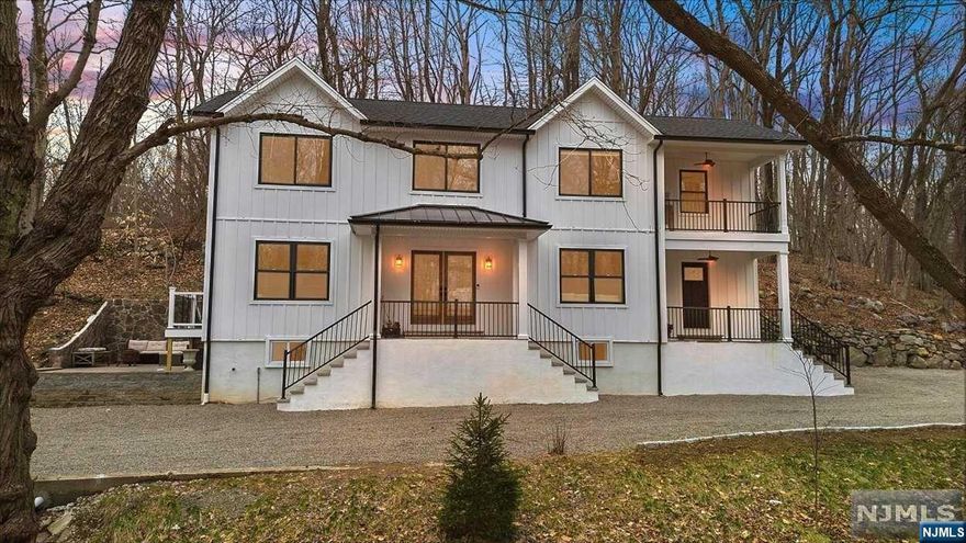 This stunning contemporary single-family home, built in 2023, has it all! As you approach the property, you'll be captivated by the breathtaking mountain views that surround the area.This home offers 3 bedrooms, and 3 bathrooms, including a luxurious primary ensuite with a separate shower and a two-person tub, perfect for unwinding after a long day. There is an optional 4th bedroom with en suite on the first floor as well. The interior features a seamless blend of wood, carpet and tile floors, complemented by recessed lighting throughout. The finishes in this home are absolutely stunning!The open kitchen is a chef's dream, boasting stainless steel appliances, premium counters, and an eat-in area, making it ideal for both casual dining and entertaining. The main level also features a welcoming foyer, ensuring a warm and inviting entrance for you and your guests.Step outside to the private yard and patio, providing the perfect setting for outdoor relaxation & gatherings.