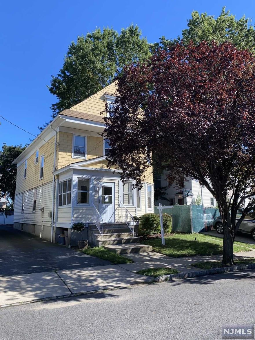Great location! Large sunny 2 family on quiet side street features 3 bedrooms on 1st flr / 4 bedrooms on 2nd & 3rd flrs, 3 full baths and large EIKs. Updates include new roof (2020), hot water heaters (2019 & 2020) and Unit 2 wall A/C (2020) as well as updated Unit 2 bathroom. It has a extra large unfinished basement with a laundry room hookup for each unit and separate utilities for all 3 levels, parking in rear of house, and is conveniently located near shopping, schools and transportation.