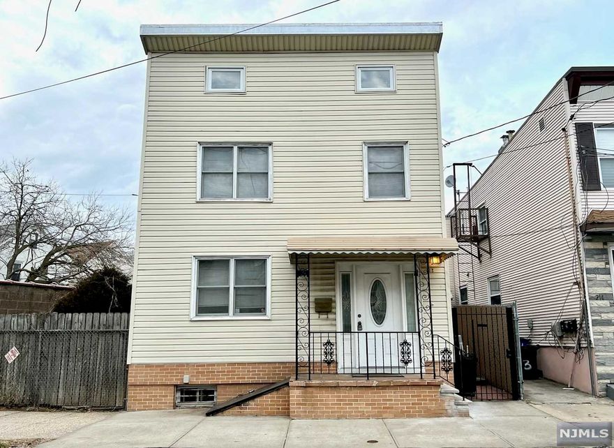 Cozy colonial renovated in 2005. Roof replaced in 2005. Central air installed in 2010. Gas steam boiler replaced in 2015. Gas fireplace & built-in bookshelves in living room (10'10x13'6). Bedroom on 1st floor (12'2x9) with a private full bath. 2 bedrooms (13'5x15'5, 9'2x10'9) & jacuzzi bath on 2nd floor. Large kitchen (14'9x11'6) with peninsula. Brand new sliding glass door from dining room (11'3x15') to yard. Fenced-in backyard with paved patio and gazebo. Hardwood and porcelain floors on 1st floor. Hardwood & laminated floors on 2nd floor. Short walk to Harrison Path Station. Furniture can stay. One-car garage has been rented from a neighbor a block away for $175 a month. The lease for the garage can be transferred to the new owner.