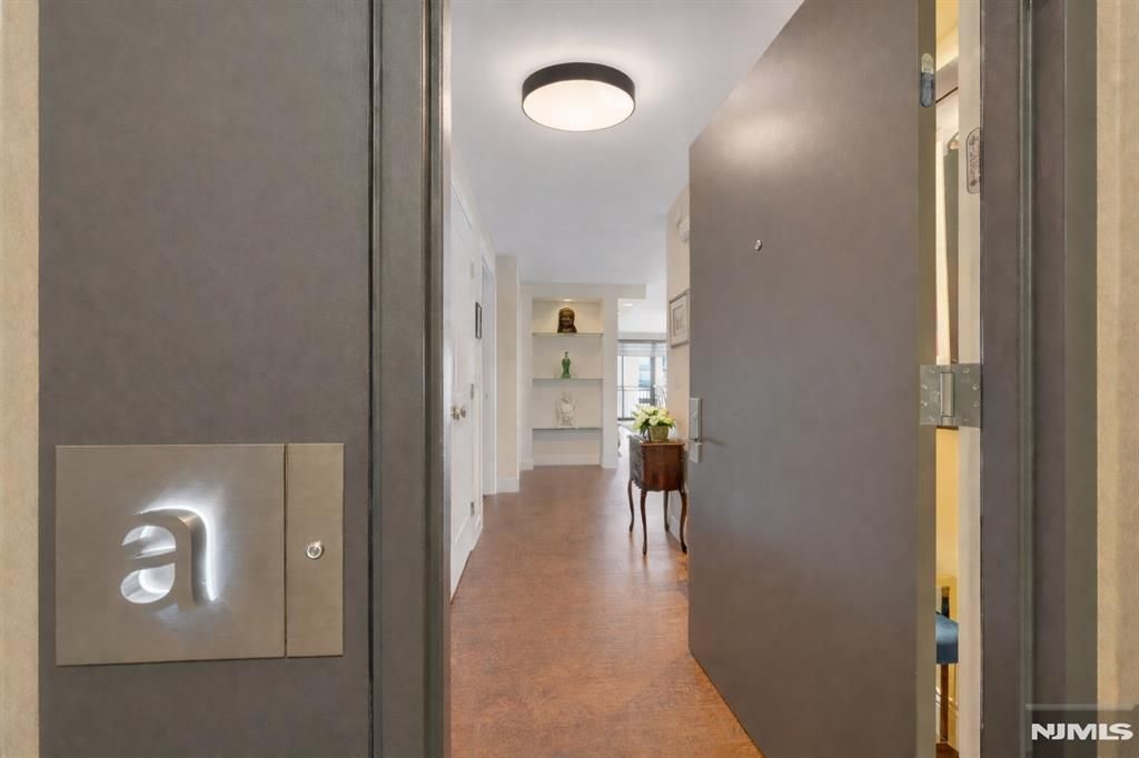 Photo of 1500 Palisade Avenue #20A, Fort Lee, NJ 07024 (MLS # 26005391)