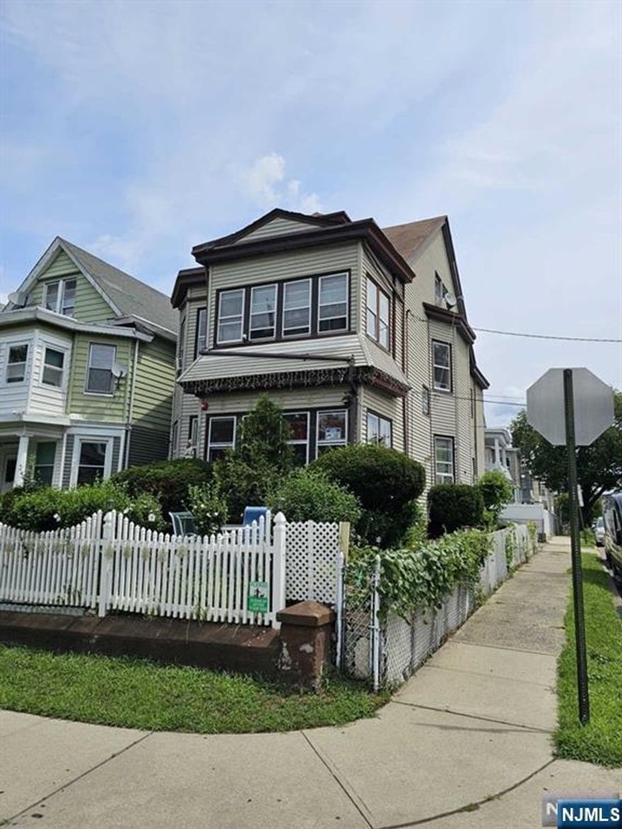 This well-maintained 2-family home in Paterson, offers a unique opportunity. Featuring two spacious apartments, each with 3 bedrooms, 1 bathrooms, eat-in kitchen, living room, and pantry. Finished attic and finished basement. This property provides ample living space for growing families or tenants. For added convenience and safety, this property offers a wired alarm system throughout. Conveniently located on a corner lot, close to schools, shopping didtrict, public transportation, and right in front of a park. Don't miss out on this fantastic home and a great money making investment opportunity.