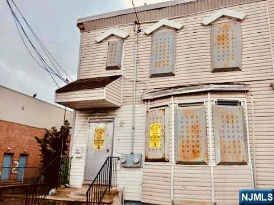 Investor Opportunity " 2-Unit Home with Income Potential!Attention investors and renovators! This 2-family home, located in an urban city setting, offers solid potential for the right buyer. Prime opportunity to build equity and generate rental income. Each unit features 2 bedrooms, a living area, kitchen, and bath, ideal for tenants or live in one unit and rent out the other. With the right updates, this property could become a great addition to your rental portfolio.