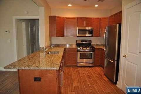 Photo of 1303 Windsor Park CT #303, Englewood, NJ 07631 (MLS # 26033327)