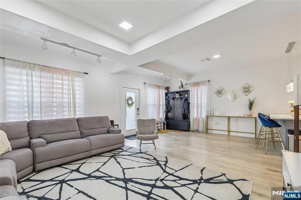 Photo of 84 Center Avenue, Little Falls, NJ 07424 (MLS # 25038794)