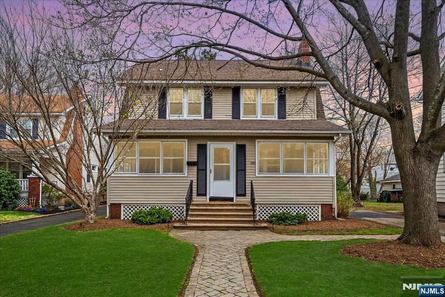 First time on the market in over 25 years, this Roughgarden two-family is located on one of the best streets in town, ideal for first-time buyers or savvy investors. Recent upgrades enhance the homeâ€™s appeal. New electrical service and upgraded wiring throughout, brand-new appliances, beautifully renovated bathrooms, and refinished original wood floors and trim that showcase their natural charm. This home offers flexibility! Maintain it as is or convert it back to a single-unit residence. The location is commuter-friendly, with quick access to NJ Transit and Rts 208/4 to the GW Bridge. The first floor features 2-BR and 1 full bath (est. rent of $2900/m). The primary bedroom includes original wood floors, stained-glass, and French doors to a bonus room, ideal for an office, nursery, or sunroom. A finished basement with outdoor access provides great storage, a half bath, and laundry. The spacious living room boasts wood floors, a wood-burning fireplace, and a multi-season front porch filled with afternoon sun. The second floor is a true 2-BR, currently configured as a 1-BR with a large living room (est. rent of $1900/m). A walk-up attic is ready to be finished as a den or lounge. Additional features include a clean 2-car garage w/ new doors and a driveway accommodating 6â€“8 cars. The gas steam boiler is roughly 5 years old, and the roofs are about 10 years old. Whether youâ€™re buying, investing, or bringing loved ones closer, this home offers charm, flexibility, and opportu