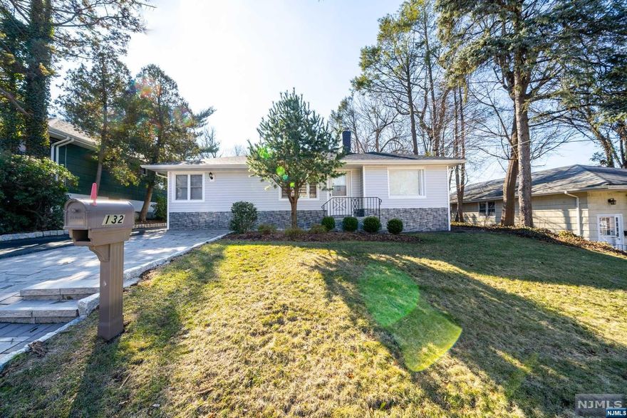 Beautifully expanded and renovated home in the quite tree-lined street of Leonia. Steps away to NY Bus Stop and close to great schools, and Easy access to all major highways. Featuring hardwood floors and Master Bedroom with ensuite Master Bathroom with a remote controlled skylight and custom closet. Master Bath equipped with a freestanding soaking bathtub and oversized glass shower stall. Large Bedrooms with custom closets and renovated full bath. Finished Basement with Washer & Dryer. Wide outdoor deck is perfect for grilling and entertaining. Dimmable lights. Newer paver. Detached 2-car garage and carriage house for extra storage. Wide and extra deep lot for unlimited potential.