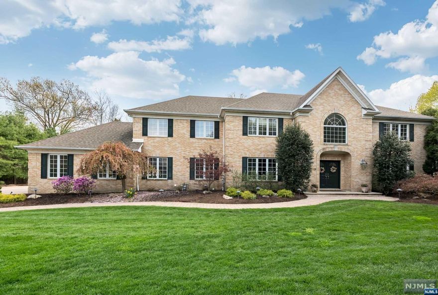 Live the good life at this spectacular 6 BR, 6.5 bath Colonial nestled at the end of a prime cul-de-sac in one of Allendale's nicest neighborhoods. Boasting nearly 5000 sq ft, this home is built for entertaining both inside and out. The star of the show is a stunning heated custom smart pool with 3 waterfalls, spa, & bench seating. Enjoy a cabana with kitchen, full bath, outdoor kitchen/grill, large patio and beautiful perennial plantings. Inside, find an open center hall layout with beautiful hardwood floors, high ceilings, freshly painted interiors & beautiful custom millwork throughout. A stunning custom library is perfect for working from home, and the bedrooms are all generous, providing comfortable space for all. A fully finished lower level contains a playroom, gym, full bath & potential 7th BR. Whole house generator. See brochure for more features. Resort-like living at its best!