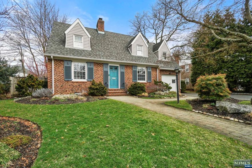 HIGHEST, CLEANEST AND BEST DUE BY TUESDAY 3/12 AT 12 NOON. Welcome to this meticulously maintained and updated 3 BR, 2.5 Bth col in the heart of Tenafly w/an ideal and open 1st fl layout ft. HDWD flrs throughout. The EF leads into the bright & airy LR w/fplc, ideal for r&r. Glass French doors lead to the den & large/open EIK, a chef's delight, ft SS appl, oversized center island w/seating & a glass sliding door leading to the BKYD. Entertain effortlessly in the DR. The 2nd floor boasts a spacious primary BR, ft 2 closets & abundant natural light. 2 add'l BRs and an updated full bth ft a double vanity, stand-up shower & oversized bathtub complete the 2nd level. The lower level offers add'l living space, incl a versatile bonus rm w/access to a renovated full bath & a laundry area w/add'l storage. Outside, the fully fenced BKYD is a true oasis, boasting lush landscaping, an expansive paver patio & fire pit, perfect for outdoor entertaining.