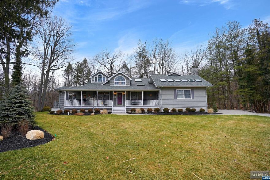 Picture yourself living in this fully updated 5 bedroom 3 bath house overlooking your private park-like yard at the end of a quiet cul-de-sac! Located in beautiful River Vale, this custom colonial is set on 3/4 of an acre of professionally landscaped, meticulously manicured property. Over 3200 square feet of living space with a spacious open floor plan and a new kitchen with granite countertops and stainless appliances overlooking your property. The first floor boasts spacious dining area with wood burning fireplace, family room with wood burning fireplace, 2 large bedrooms, laundry and a full bathroom. Going up the stairs brings you to 3 more bedrooms including the oversized primary suite with walk in closet, updated bathroom and stairs leading you directly outside. This beautiful home has a new sprinkler system, the roof is 4 years old, water heater is 2 years old, floors and carpeting recently installed with a fully finished basement with french drains!