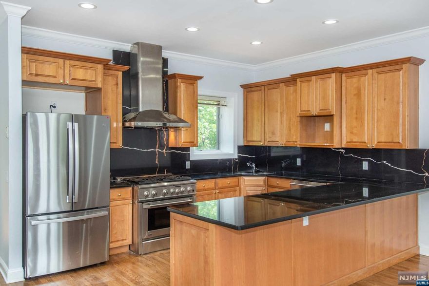 Location , Location!! Bayonne's most prestigious water view community built 2006 open layout for living and dining area offers the finest interior Oak hardwood floors, maple cabinets, with corian counter tops ,high ceiling, cathedral ceiling in master's bedroom, recessed lighting, deck, terrace overlooking the bay ,jacuzzi style tub in master bedroom. Electrolux central vac.S.S Appliances . Listing address is 195 WEST 21ST ST postal address. Tax record address is 193 W21st, Bayonne. HOA is $200/MO covering lawn and snow removal . Pictures will be updated it soon .