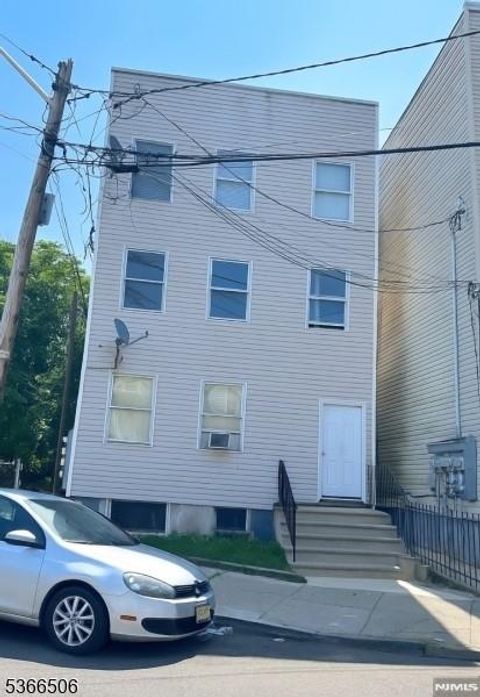 Photo of 23 Highland St #1, Paterson, NJ 07524 (MLS # 26014371)