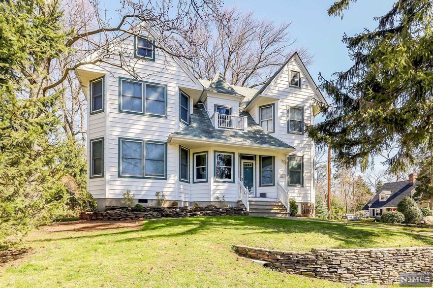 ATTENTION TENAFLY SHOPPERS, THIS IS THE ONE YOU HAVE BEEN WAITING FOR: a 5-6 BR, 3.5 Bath with 2 PRIMARY SUITES--featuring a SUITE ON THE 1st FLOOR & ANOTHER, 2 ROOM SUITE, ON THE 2ND FLR. Beautifully expanded and renovated in 2000 (plus a new hall bath in 2022) this elegant home features 11 rooms on 4 levels. Don't need a suite on the 1st floor; make it a family room. Don't need a 2 room suite on the 2nd floor; use it as 2 BRs (making up to 5 BRs on 2nd Flr). The fantastic 1st floor also features a large kitchen with spacious dining area looking over the fabulous deck and backyard, plus a light & bright living room & dining room. The 3rd floor is finished, ideal for an office or studio, and the basement is also finished with Rec room, laundry and storage. Beautiful 75x120 lot, close to High, Middle & Elementary Schools, parks, NYC transit, downtown Tenafly, & worship; multi-zone heat and AC, mud room, 2 car garage, and FINALLY, ROOM FOR EVERYBODY, LET'S GO!!!