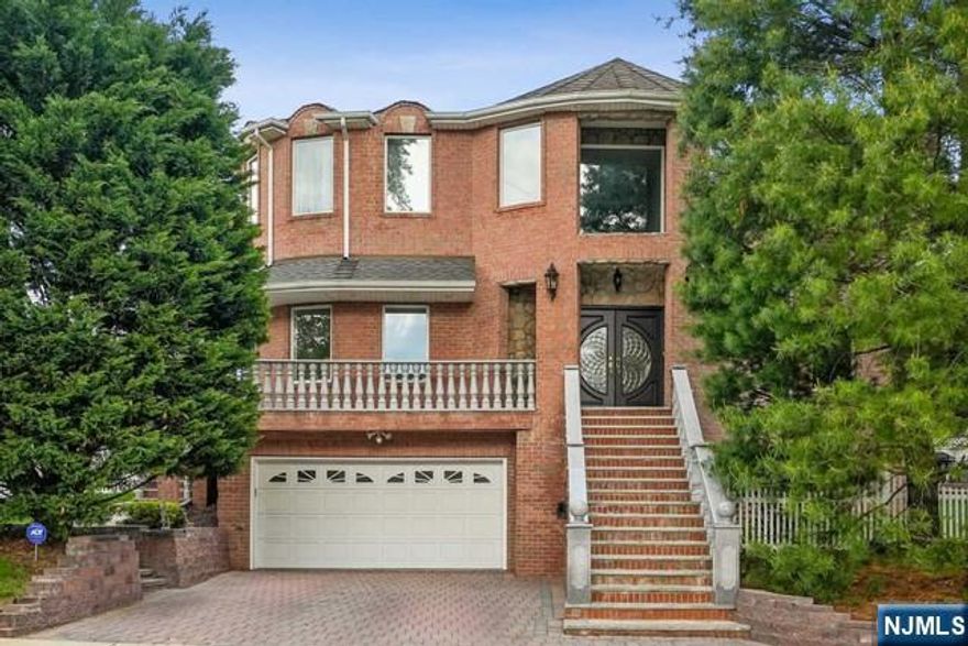 Built in 2008, This Stunning property is a 6 BDRM, 4 BATH Center Hall Colonial with a Grand 2-story entry featuring a Swarovski crystal chandelier. The 1st floor offers a formal dining room and a gourmet kitchen equipped with top-of-the- line stainless steel appliances, custom cabinets and granite Countertops. The living room includes a gas fireplace, there is also a bedroom and family room on this level. Moving to the 2nd Floor, you'll find a master suite with Fireplace, Bathroom w/jacuzzi tub and walk in closet. Additionally, there are 3 more bedrooms, FBATH and Laundry room. The fully finished walkout basement features a multi-use room/family room with Dry Sauna another Bedroom and 1 a full bathroom. The back and side yards are nicely Landscaped and perfect for entertaining. This property is a MUST SEE with luxurious features throughout!