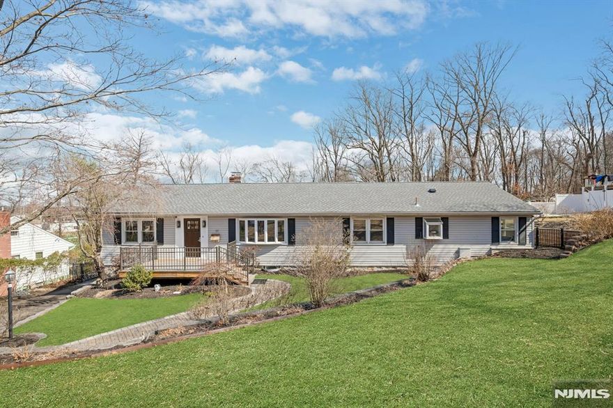 Spacious 5-Bedroom Ranch " Perfect for Additional Family! Look no further! This beautifully designed 5-bedroom, 3-bathroom ranch has everything you need. The main level features an industrial-style Kitchen, Dining Room, and a cozy Living Room with a fireplace. The primary suite is a true retreat, complete with a sitting area, fireplace, and an updated en-suite Bath. Entertain in style in the bar area, which has French doors that open to an expansive deck and pool area, perfect for gatherings. The lower level offers a private living space. It includes a full Kitchen, Dining Area, Living Room, Bedroom, and Full Bath, with a walkout to a stunning Patio. Don't miss this incredible opportunity schedule your showing today!