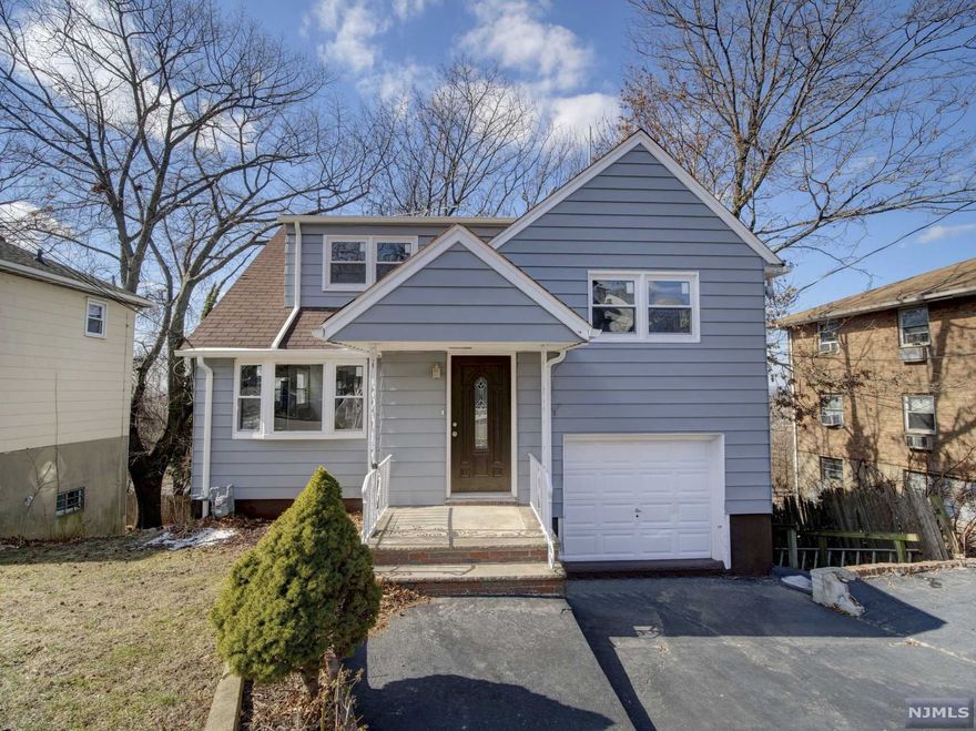 Welcome to this immaculate single family home in desirable town of Palisades Park with 4 bedrooms 2 full bathrooms. This astonished home offers finished ground level with separate entrance one bedroom, bathroom & kitchen Ideal for extended family. This property offers an open modern concept through living room and kitchen with gorgeous white granite countertops. The second floor features 2 bedrooms, full bathroom, 3rd floor features a large Bedroom. Additional features include hardwood floors throughout the house, new windows, recessed lighting, stainless steel appliances, and tons of natural light. Close to shopping and one block from NJT bus for NYC.