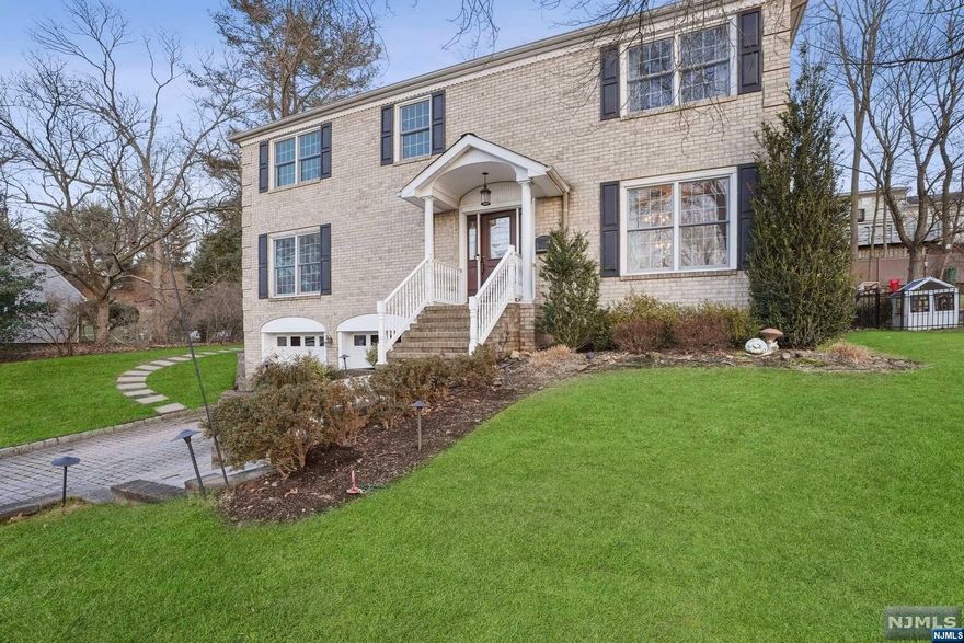 This updated Col checks every box on the livability scale! Quiet neighborhood, bathed in afternoon sunlight w/Western sunset views. Inside CH entry leads to Living Area, FDR & bright, spacious Fam Rm w/gas FP, huge windows & doors to outside. Fabulous, EIK w/center island, 6 burner Wolf stove/oven, additional Wolf oven, farm sink, custom cabinetry w/sliding door to Patio. Primary Ensuite w/vaulted ceiling & a wall of windows allowing wonderful natural light. Primary Bath w/dual sinks, jet tub & separate shower. Separate Hall Bath, 3 additional Bedrooms & Laundry Area. Finished Lower Level Suite with full Bath & Garage access. Outside, large low maintenance backyard w/hardscape. Outdoor Kitchen w/stone countertop, built-in Blaze grill & ref & storage drawers. Dine alfresco under the pergola exterior lighting. Terrific patio doubles as dance floor. Built-in fire pit. A great home for living and entertaining. Central air. You'll thrive here!