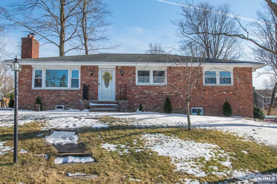 Gorgeous, renovated 3 bedroom, 2 bath ranch on corner lot in Cliffwood Lake! Main floor consists of entry foyer w/coat closet, open living room w/wood burning FP & dining area, updated eat-in-kitchen w/massive center island, SS appliances & granite counters, master suite w/large walk-in closet & full bath w/stall shower, 2 more guest bedrooms & renovated guest bathroom w/ tub/shower & granite counters. Home also features a finished walk-out basement, 2 car tandem garage, hardwood floors & central air! Septic is only a few years old, installed in 2019! Brand new gutters with leaf guards. Cliffword Lake includes beach w/lake access, ball field & playground!