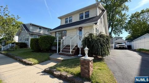 Photo of 49 Orange AVE, Elmwood Park, NJ 07407 (MLS # 26020464)