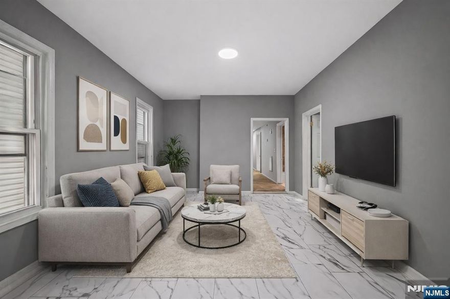 Turnkey 3-Family Investment in Paterson! Fully occupied and income-producing, this legal 3-family offers 11 bedrooms, 3 full baths, and a full unfinished basement with value-add potential. The 2nd and 3rd floor units are newly renovated, and all units are rented to reliable, long-term tenants. Featuring a new roof (2021), updated utilities, and a strong GOI, this property is a cash flow machine in a high-demand rental market. Ideal for investors or 1031 exchange buyers seeking immediate returns. Sold strictly as-is.