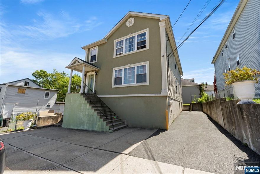 Experience refined modern living in this newer constructed two-family residence, ideally located in Paterson just minutes from Haledon. Each spacious unit features 3 bedrooms and 2 full bathrooms, highlighted by a luxurious master suite with a private en-suite bath your personal retreat.The thoughtfully designed main living areas flow seamlessly into a fully finished basement, offering remarkable flexibility with additional rooms and a second full bath perfect for extended individuals or recreation.Step outside to enjoy your own private backyard, a serene escape ideal for entertaining guests, gardening, or simply relaxing in comfort. More than just a home, this property presents an exceptional opportunity for sophisticated living, blending style, space, and practicality in one elegant package.The original property was built in 1888; however, it was fully rebuilt and expanded in 2011. View 3D Tour: https://tours.vbiphotography.com/sites/mnaogaw/unbranded