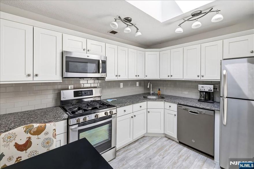 Rarely available Penthouse at River View on the Park! Spacious 1,205 sq. ft. 1-bedroom, 1.5-bath condo offers a modern design with gorgeous Hudson River and NYC skyline views and a large terrace to enjoy. An open, airy living room and dining space perfect for entertaining. Tastefully updated kitchen with stainless steel appliances, backsplash, granite countertops, and a skylight that fills the space with natural light. A spacious master bedroom with generous closet space and a thoughtfully designed en-suite bath featuring a soaking tub and separate glass enclosed shower. Full-sized laundry room and half bathroom. Condo amenities include a community room, gym, doorman, super, parking and semi-private elevator access. Walking distance to all types of shops, local restaurants, NYC transit, and the Edgewater Ferry. Maintenance of $700 includes water, hot water and common areas. LOW Taxes $6,269. Parking is available for $50. INVESTOR FRIENDLY!