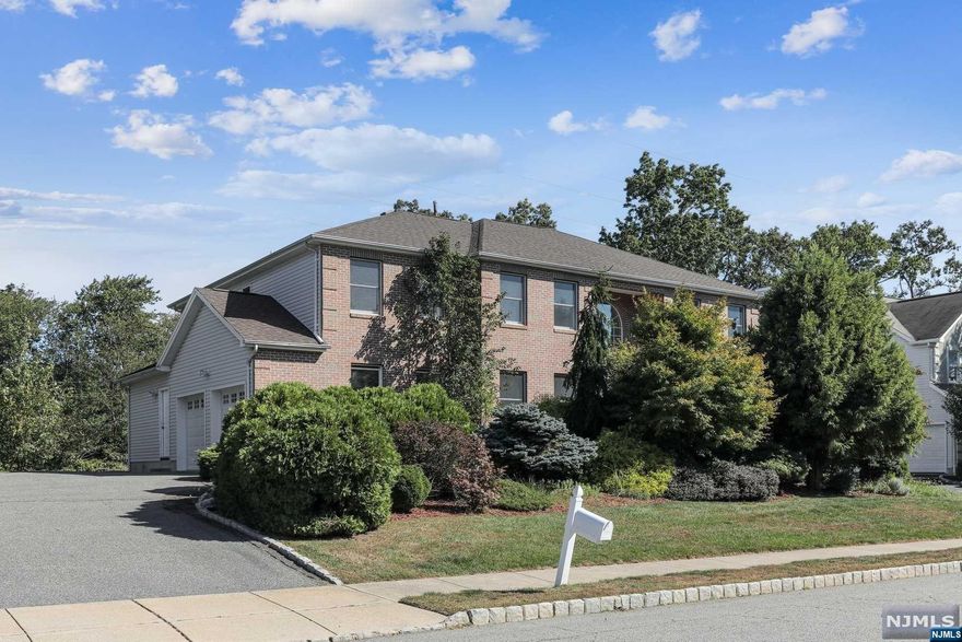 Great young Col. with brick front located in desirable street. 2 story entry foyer, one bedroom 1st floor. Open & airy, high ceiling, leveled backyard. Bright and light! Spacious! All wood floor throughout the entire house. all public utilities. Fire place flute all "as is" fro no known issues.