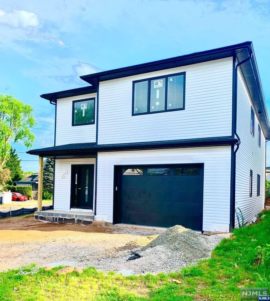 Wow!!! Completely new construction on brand new foundation! Unbelievable craftsmanship shines through every inch of this newly built home. From the beautiful open layout on the first floor, to the stainless steel appliances and electric fireplace. Perfect living on the second floor with a large master bedroom with a master bath, a junior suite with a full bath and 2 additional bathrooms and an additional full bath. Laundry room upstairs! Oversized built in 1 car garage and 2 parking spaces in the driveway! So many more features, you'll have to see for yourself! More pictures coming soon! Note: Taxes still being assessed. Owner Holds RE License.