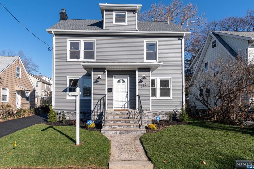 Everything is completely new in this stunning 5 Bed, 2 Full BA, 2 Half Bath Colonial w 2,185+/- sf of finished living space on a large flat lush lot. The traditional details of the exterior welcome you to the vestibule w 2 closets, main foyer w Formal Living Room with electric fireplace, Powder Room and rear entrance to backyard w concrete patio and detached 2 car garage. Continue to the open floor plan Kitchen and Dining Area. The Kitchen is complete w white custom Shaker style cabinets, spacious breakfast bar, quartz countertops, stainless steel appliances. The 2nd floor is home to all 4 Bedrooms and 2 Full Bathrooms. The Primary Bedroom is equipped with a spa-like bathroom w stall shower, vanity & large closet. The 3rd floor is finished for additional living space & complete w a half bath. Full finished basement w laundry room & storage closet. Additional features include hardwood floors throughout, custom trim work & moldings and designer tiles and finishes.