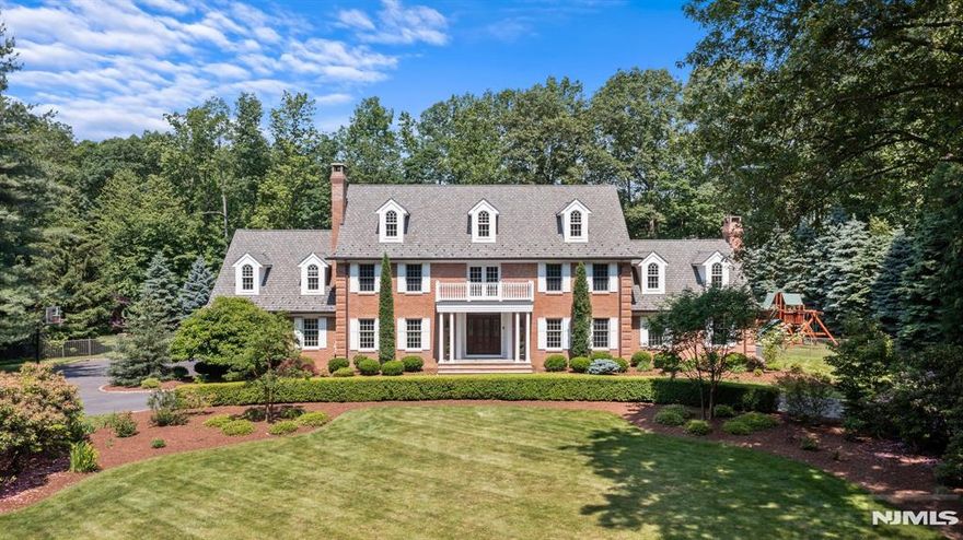 MODERN ELEGANCE,CLASSIC DESIGN,QUALITY CONSTRUCTION & EXQUISITE CUSTOM MILLWORK come together in this stunning Full Brick Home on a coveted street in Saddle River! Built by John Avanzato,this home underwent a transformative gut renovation in 2015, blending classic design w/modern luxury. Boasting 9' ceilings on the main level, hwd floors, & an open floor plan designed for everyday living & entertaining.You will be WOWED from the moment you enter the 2-story Foyer that opens to an exquisite wood paneled Office W/Fpl, offers the perfect workspace.The custom MEIK features top-of-the line app,a huge center island, abundant counterspace & a picturesque breakfast area that flows into the stunning GR. With its soaring 17-foot ceilings, grand fpl, & striking architectural beams, this space exudes both elegance & warmth. Also on the main level are a DR,PR, versatile craft room/office, & a Laundry Rm.Take the Grand staircase to the 2nd Flr where you will find the LUX Primary Suite w/tray ceiling, 2 WIC's & specialty spa bath & steam shower. A Br Ensuite,3 add'l BR's & 2 FB's. Huge finished basement has a Rec Rm,Gym,FB, & Plenty of Storage.Private fully fenced backyard boasts specimen trees,vibrant plantings, outdoor kitchen, & gorgeous in-ground gunite,saltwater,heated pool w/spa.The Travertine patio showcases Guest House/Cabana, w/ its full basement,laundry,FB, & a Chef's Kitchen featuring Wolf & Sub-Zero app.A sprawling lawn further enhances this backyard oasis.Excellent Schools!!