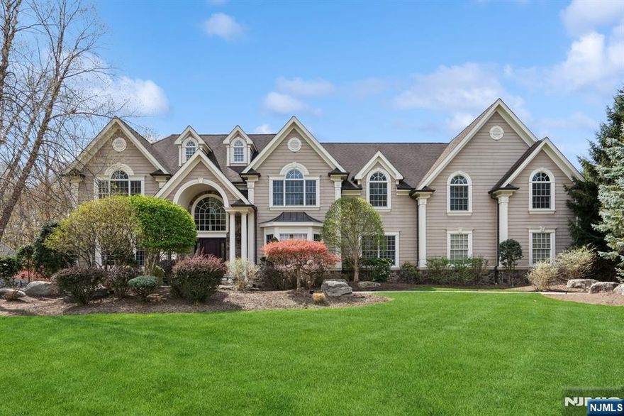 Welcome to this exceptional Leonard-built custom home, designed for luxurious living. Spanning 9,200sq. ft. w/base-newly finished 3,000 sq. ft. basement, this residence features a stunning two-story foyer, elegant living and dining rooms, and a spacious family room with a cozy fireplace. The gourmet kitchen boasts state-of-the-art appliances and a generous layout, complemented by a convenient mudroom and multiple baths throughout. The second floor is a haven of relaxation, hosting a sprawling primary suite with a sitting area and large walk-in closet, along with a junior suite, a Jack-and-Jill bath, and a study. The beautifully finished basement offers endless entertainment options with a theater, game room, gym, and rec room with a fireplace. Step outside to discover a resort-style backyard featuring a heated saltwater pool, waterfall, hot tub, custom built-in fire pit, water slide and a fully equipped outdoor cabana perfect for gatherings. This dream home truly has it all.