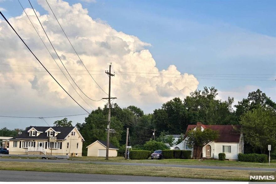 Incredible Redevelopment or Investment Opportunity! 2 Properties being sold together. 584 and 588 US Highway 46. An office building and a residential home. #588 is a 1572 sq ft office building recently renovated and has newer steps, roof, well, furnace. Zoned HD, special highway development Oversized detached garage, lots of parking, backyard. #584 is 1562 sq ft and is a 3 bedroom cape cod home with a backyard and is currently being rented. Zoned C1. Together, these properties offer excellent highway frontage, strong visibility, making them ideal for investors owner occupants, or developers seeking a prime location with multiple possibilities.