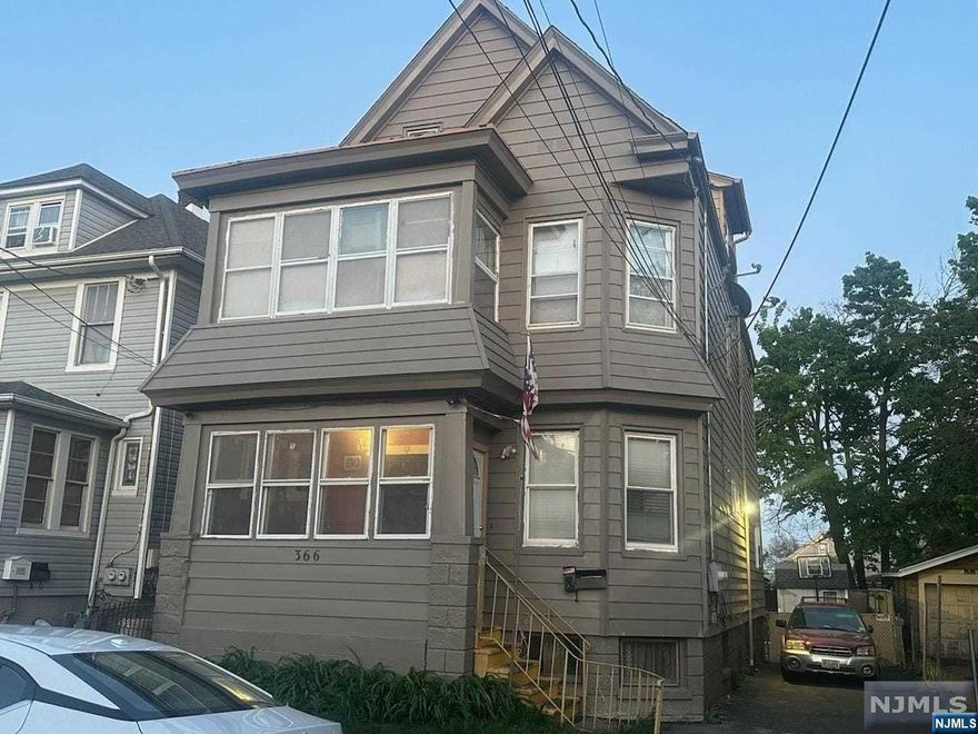 Spacious 2 family, featuring 2 bedroom each floor, living room and eating kitchen, finish attic, Central air, partially finished basement. Parking for more than 5 cars. Being Sold As Is condition