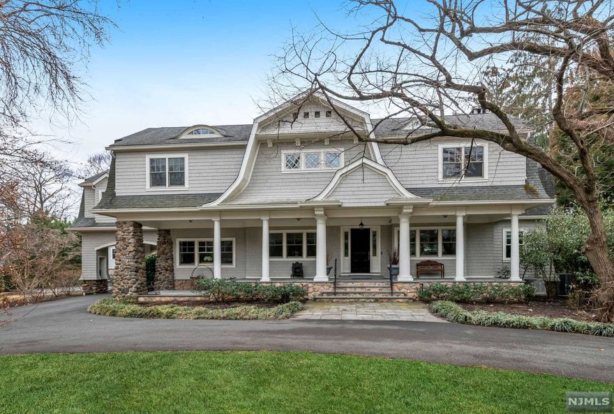 Impressive!This is your opportunity to enjoy a completely renovated & expansive home,set on a private acre of property in idyllic downtown Ho-Ho-Kus! Close proximity to school, bus, train & all that desirable HHK offers. This beautifully renovated & meticulously designed Hamptons style colonial is tucked back from the road, in this incredibly private setting! Detached 2 story guest house overlooking heated, gunite pool w tremendous adjacent open yard space. A complete renovation in 2010, the entire home was rebuilt from top to bottom w incredible details including cedar shakes, pella windows, custom ceiling designs & beautiful moldings. Fabulous layout & flow throughout! 4 BR suites plus 2 second flr bonus rms. Finished lower level w/ full bath. 2-story guest house offers tremendous extra space w BR, bth & kitchenette-all overlooking fenced in pool. Mature & magnificent shrubbery, including privacy hedges along Hollywood. Circular driveway & covered portico. More on Virtual Tour!