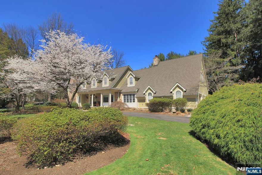 Welcome home to this lovely Center Hall Colonial with 4 Oversized Bedrooms, 2 ensuite. Located in desirable Woodside School district and Shadow Lake. Generous and spacious rooms throughout with detailed moldings, coffered ceilings, and freshly painted. Great room off kitchen includes gas fireplace, wet bar and back stairs to 2nd floor. Private 1st floor office with Built-ins and french doors. Primary Bedroom with 2 walk in closets, high ceilings and primary bath. 2nd ensuite Bedroom with private full bath. Bonus Game room with back stairs. Lower level is finished with possible Fitness Room, Rec and Hobby room and full bath! Private fenced back yard with terraced walls, mature landscaping and room for a pool! Close to school and houses of worship